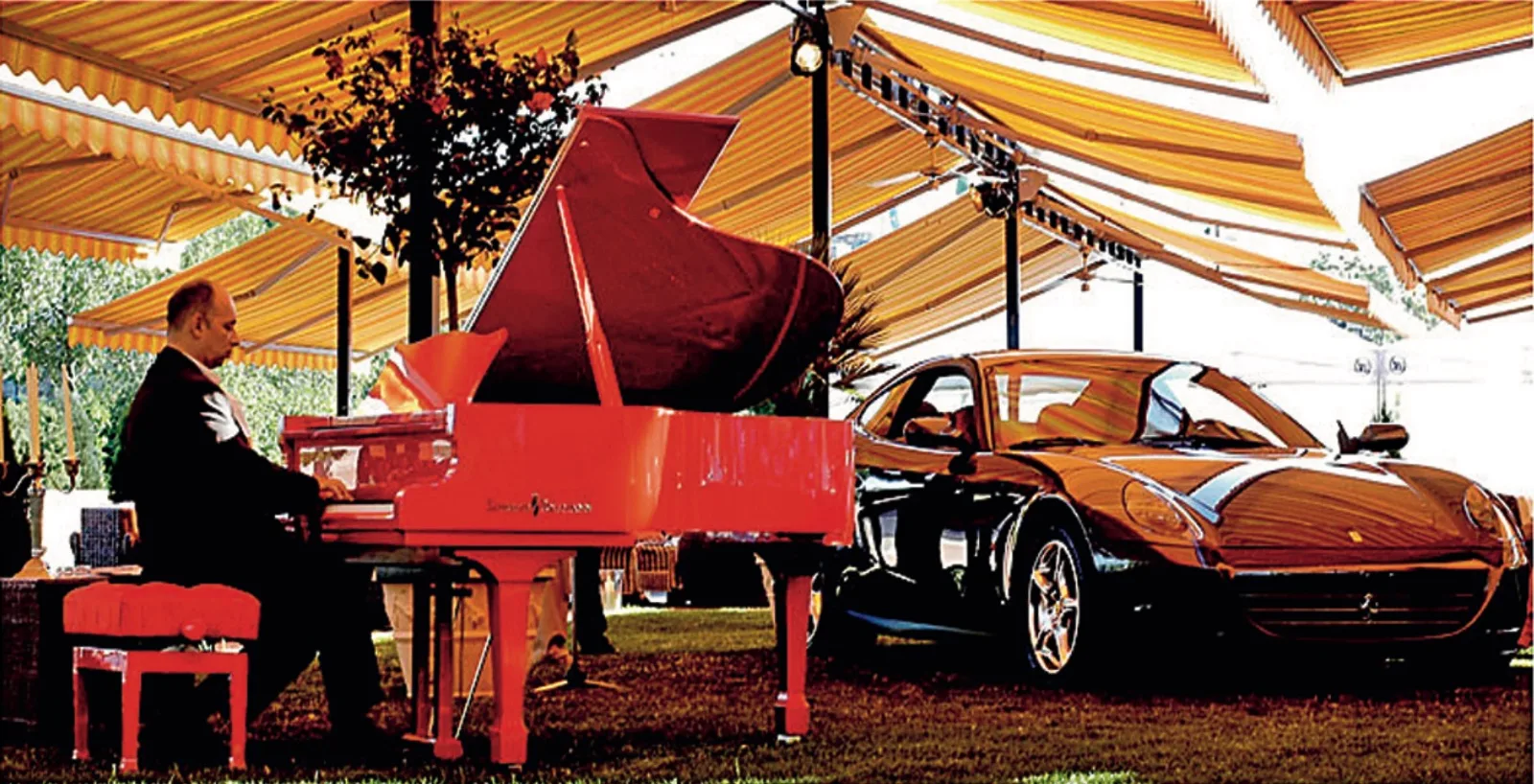 Il coda rosso Schulze Pollmann accanto alla Ferrari 612 Scaglietti